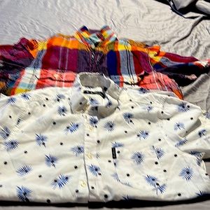 Size:s  , 2 shirts,one is color white with blue y the 2nd. Is multicolor